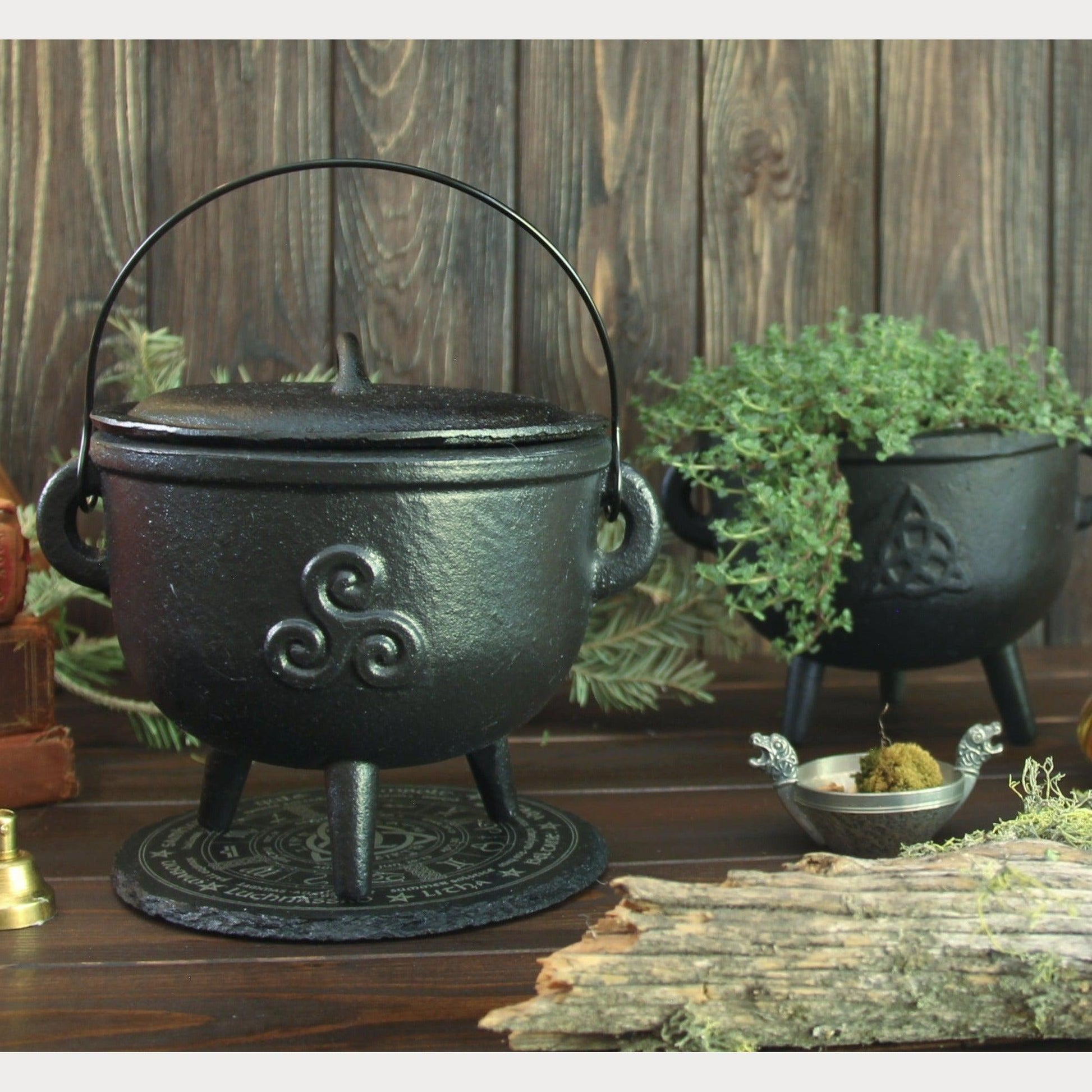 https://hecateslight.com/cdn/shop/products/Large-6-Cauldron-Cast-Iron-Pot-Hecates-Light-Hecates-Light-metaphysical-witchy-gifts-witchcraft-magic-cottagecore-cottage-witch-nature-2.jpg?v=1666975181&width=1946