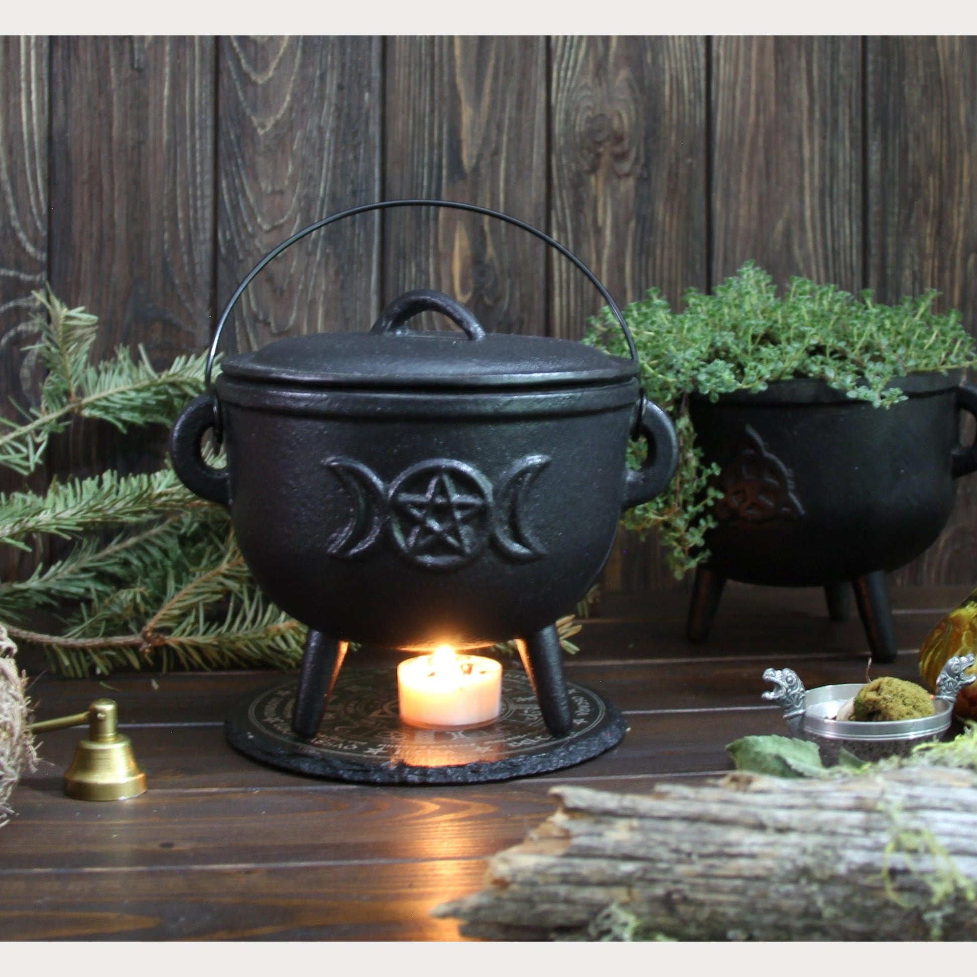 https://hecateslight.com/cdn/shop/products/Large-6-Cauldron-Cast-Iron-Pot-Hecates-Light-Hecates-Light-metaphysical-witchy-gifts-witchcraft-magic-cottagecore-cottage-witch-nature-3.jpg?v=1666975187&width=1946
